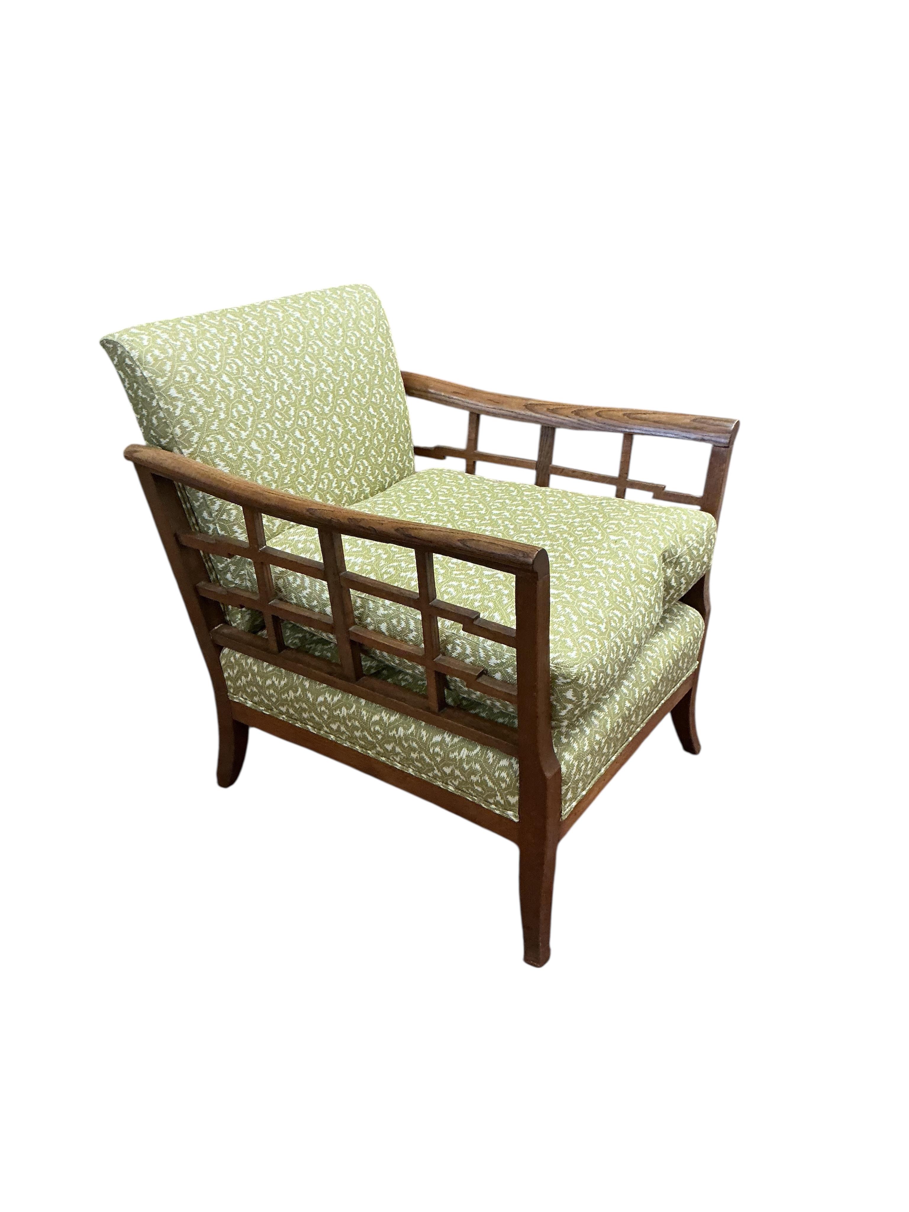 A 1920's oak framed armchair, width 72cm, depth 74cm, height 78cm
